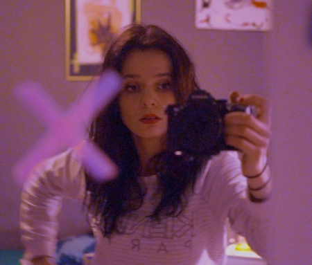 Artist self-portrait in the mirror.
